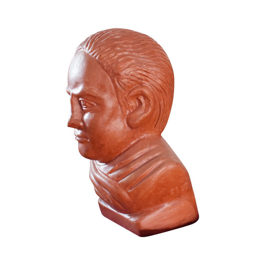 A detailed left-profile view of a handcrafted terracotta bust of Ishwar Chandra Vidyasagar. This clay sculpture highlights the distinct facial features and traditional shawl drapery of the Bengali Renaissance icon, presented in a natural reddish-brown earthenware finish against a white background.