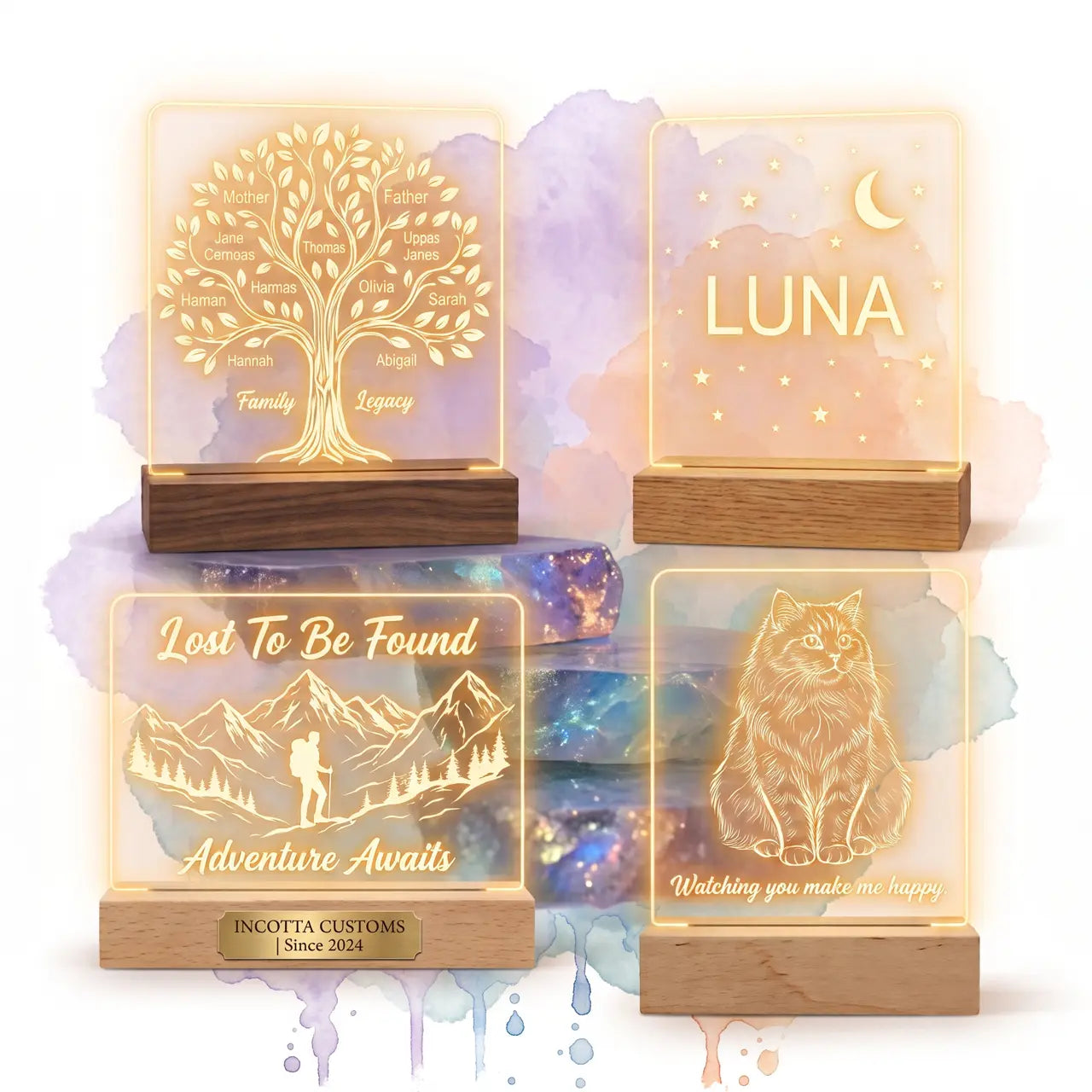 Four custom-etched, glowing acrylic lamps on wooden bases: family tree, Luna name, mountain landscape, and cat portrait.