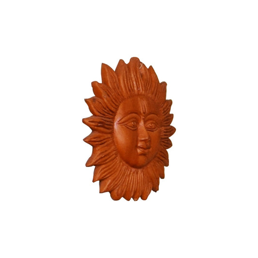 Side view of handcrafted terracotta wall hanging depicting Surya sun face with radiant rays, natural clay decor from Panchmura, Bankura