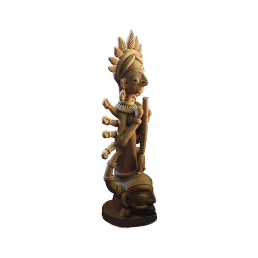 Side view of handcrafted terracotta Durga statue made in Panchmura, Bankura, depicting Hindu goddess Durga in warm clay finish
