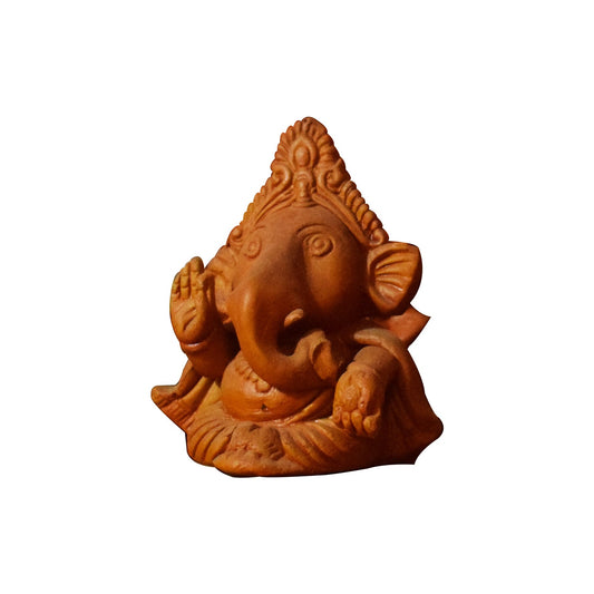 Side view of a handcrafted clay Ganesha idol sitting with blessing gesture, natural brown terracotta sculpture made in Panchmura, Bankura