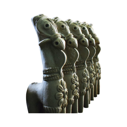 Side view of four handcrafted terracotta horse figurines made from natural clay, created in Panchmura, Bankura, ideal for traditional home decor