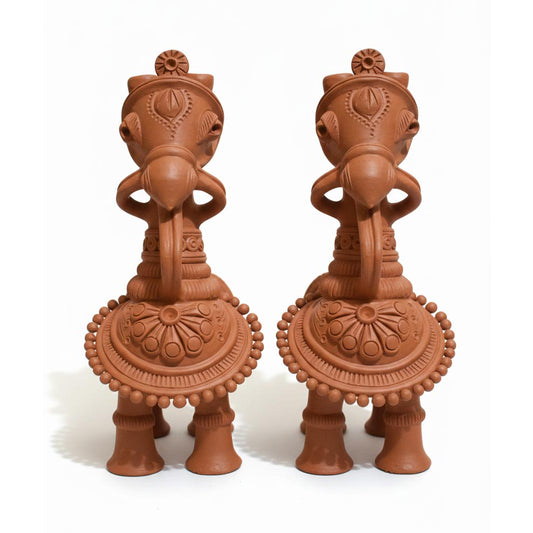 Indian folk art terracotta horse sculptures in pair, handcrafted clay decor for traditional interiors.