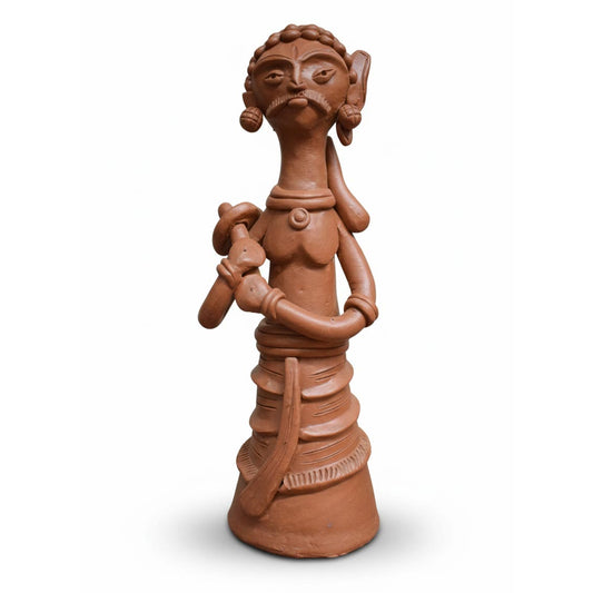 Indian folk art terracotta sculpture of a tribal female figure, handmade clay statue with cultural and ethnic craftsmanship.