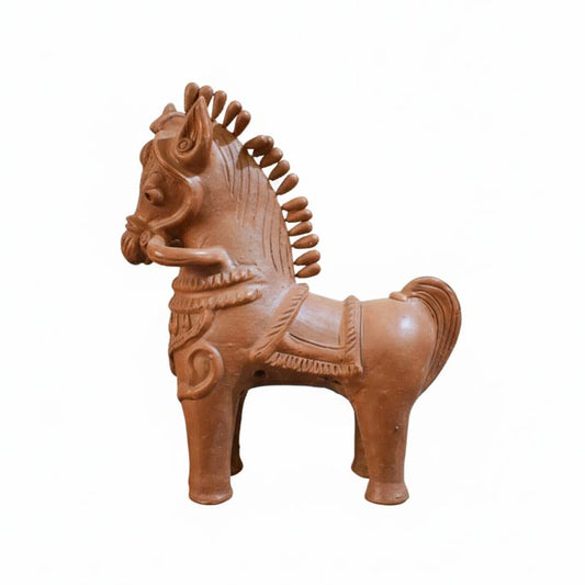 Handmade terracotta horse figurine representing Indian tribal art, used as decorative clay sculpture for interiors.