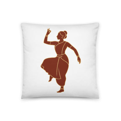 A white square decorative throw pillow cover featuring a stylized, terracotta-colored illustration of a woman performing a classical Indian dance pose. The minimalist design depicts a dancer in traditional attire with gold outlines, captured in a graceful mudra stance.