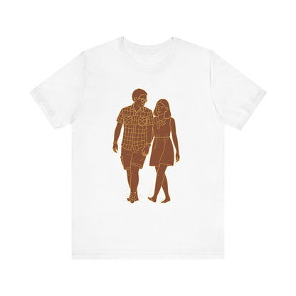 Personalized matching couple t-shirts in white with custom brown portrait drawing, unique anniversary gift idea.