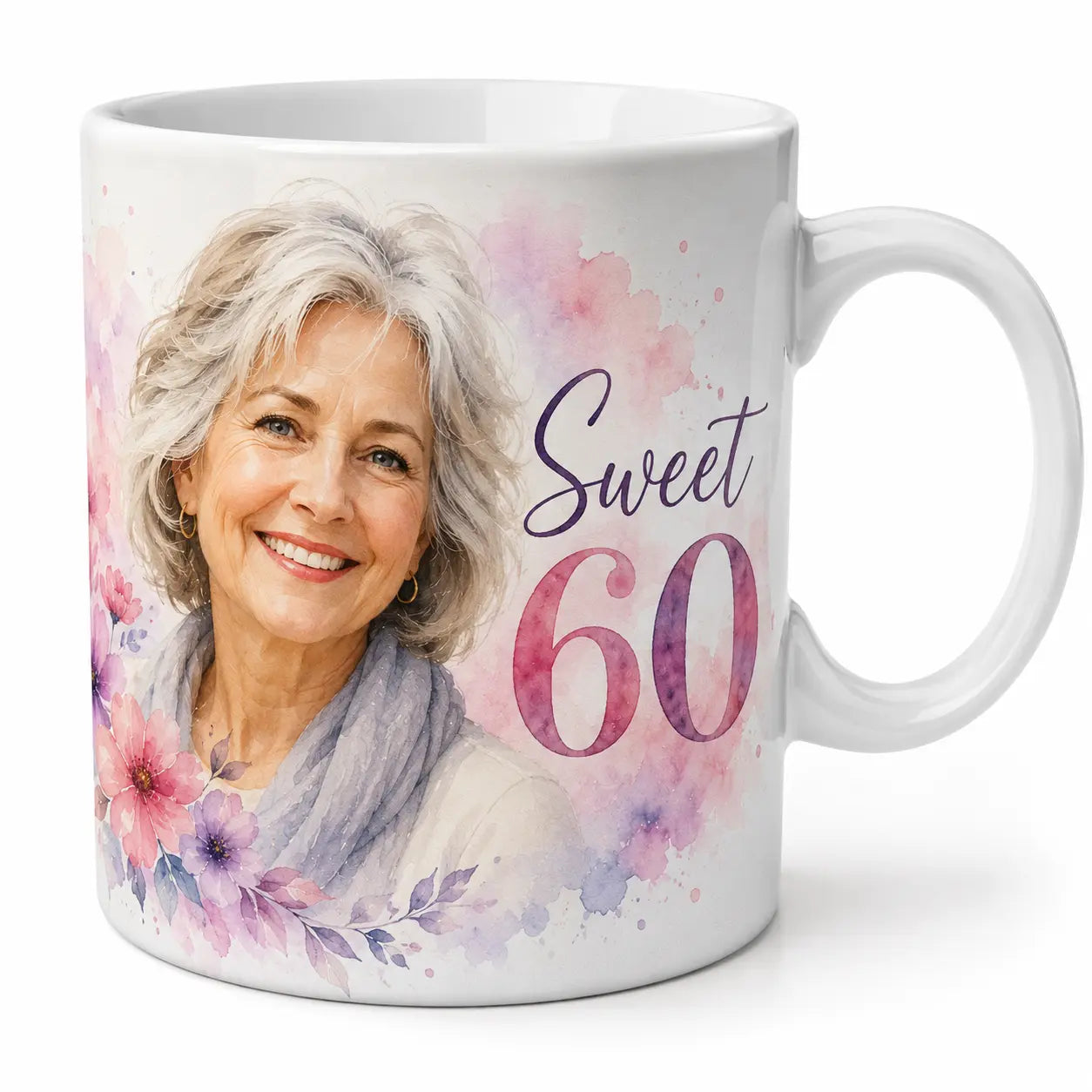 A glossy white ceramic coffee mug featuring a custom watercolor 60th birthday portrait of a smiling woman, framed by pink and purple floral accents with Sweet 60 text. Free shipping by Incotta.