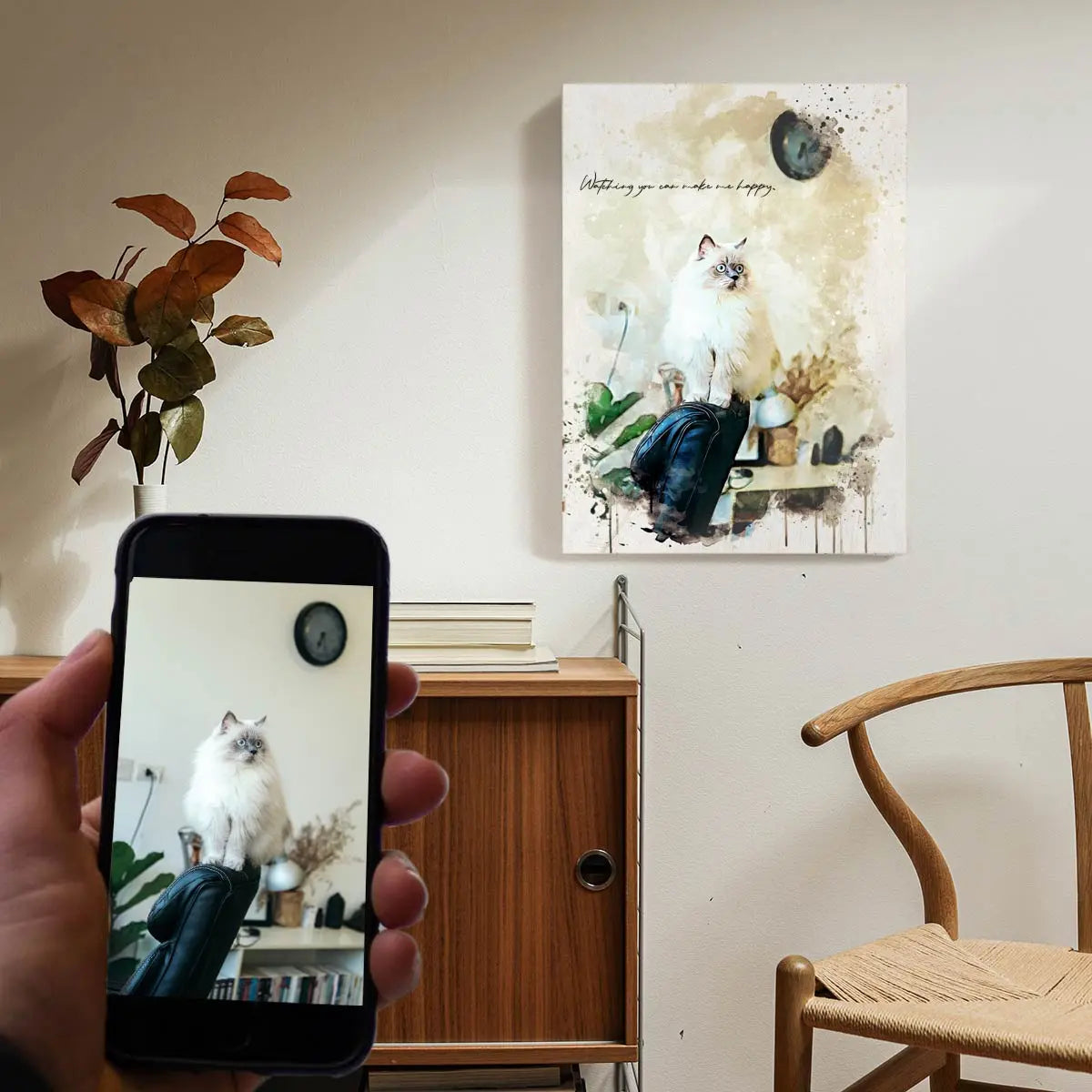 A custom watercolor pet portrait canvas featuring a fluffy white cat sitting on a chair, displayed on a bright wall above a mid-century wooden cabinet. Free shipping by Incotta.