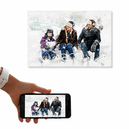 A customer holding a smartphone displaying a family in the snow next to the resulting custom watercolor family portrait canvas. Free shipping by Incotta.