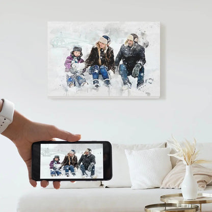 A custom watercolor portrait canvas featuring a family of three sitting in the snow, displayed on a bright living room wall above a white couch. Free shipping by Incotta.