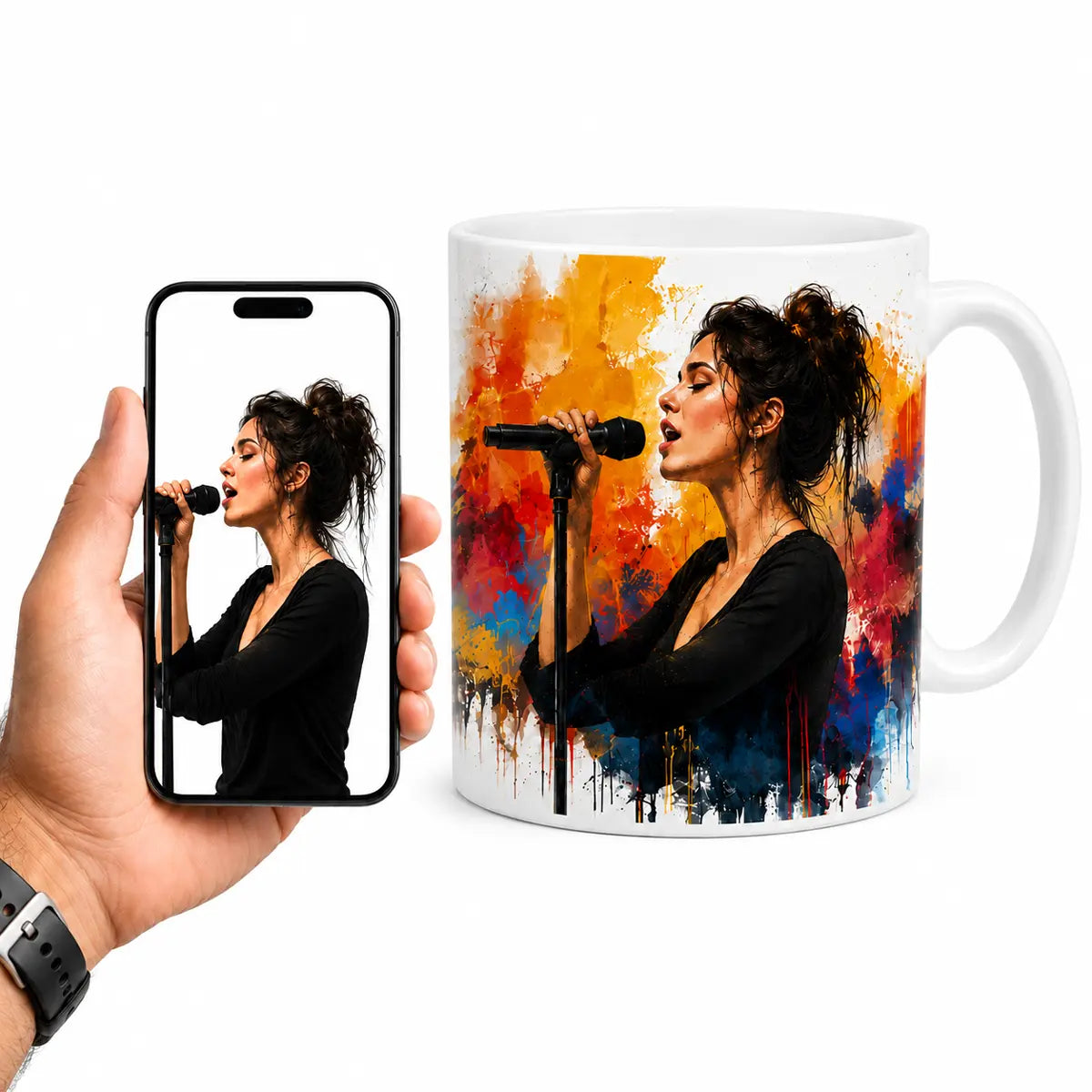 A custom watercolor portrait mug featuring a woman singing into a microphone against vibrant orange and blue splashes, displayed next to a hand holding a smartphone with the original reference photo. Free shipping by Incotta.