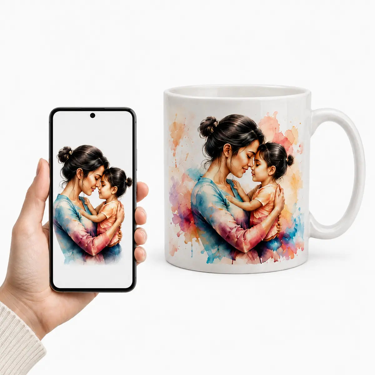 A custom watercolor portrait mug featuring a mother and young daughter affectionately embracing, displayed next to a hand holding a smartphone with the reference digital artwork. Free shipping by Incotta.