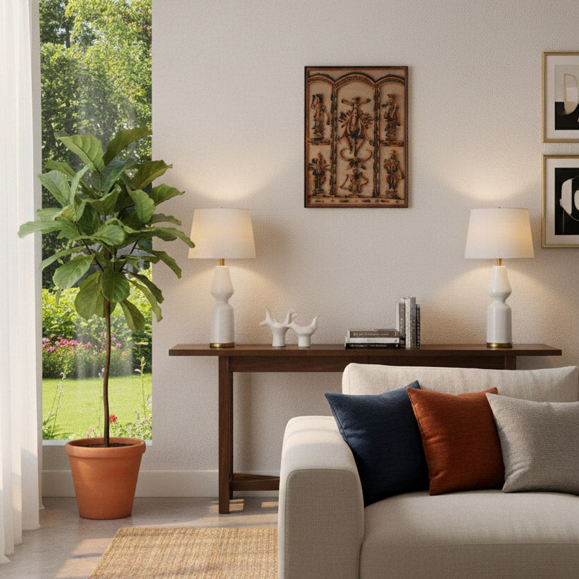 Indian handicraft tribal wall art showcased above a console table in a stylish modern living room.