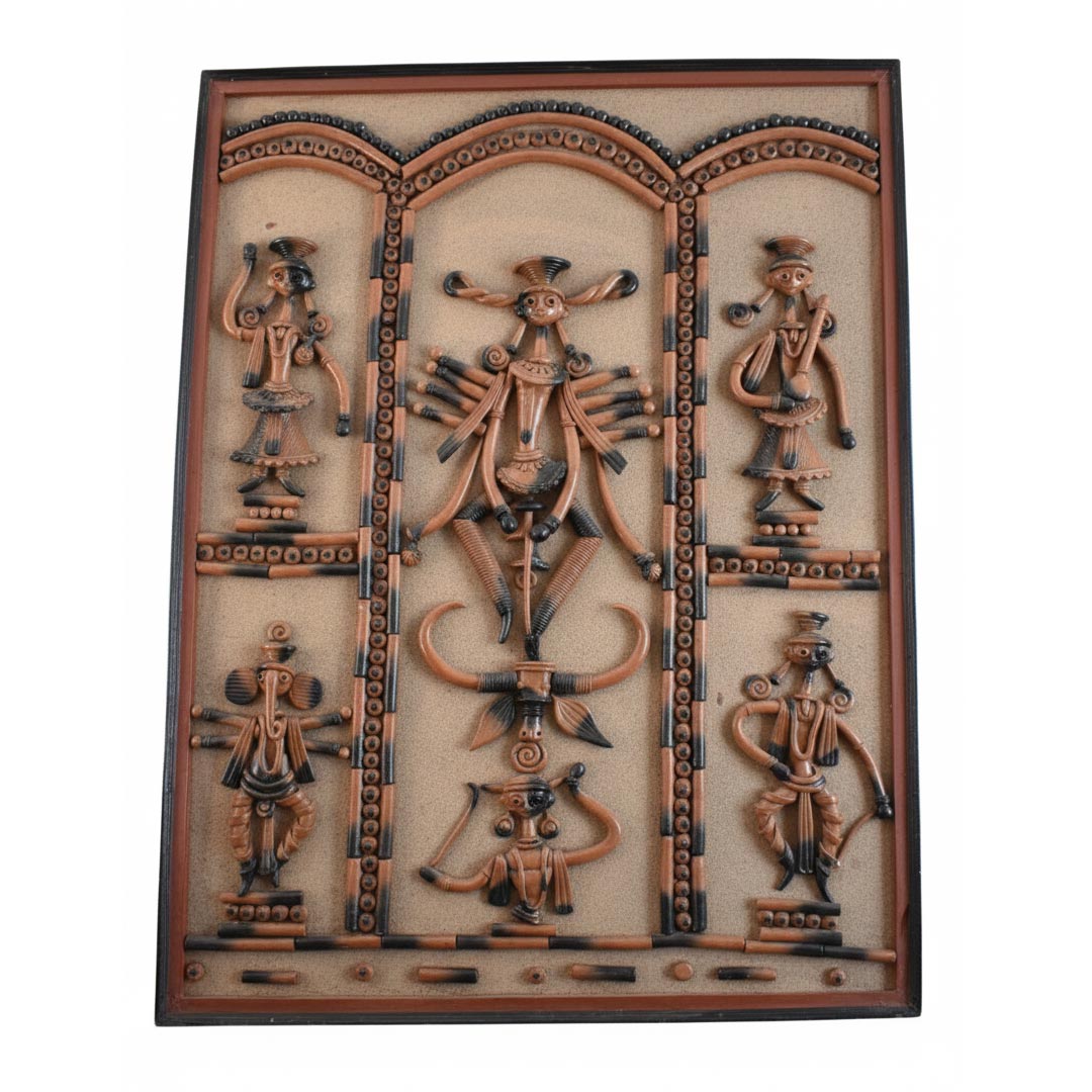 Indian handicraft tribal wall hanging depicting folk dancers and deity symbols, ethnic home decor panel.
