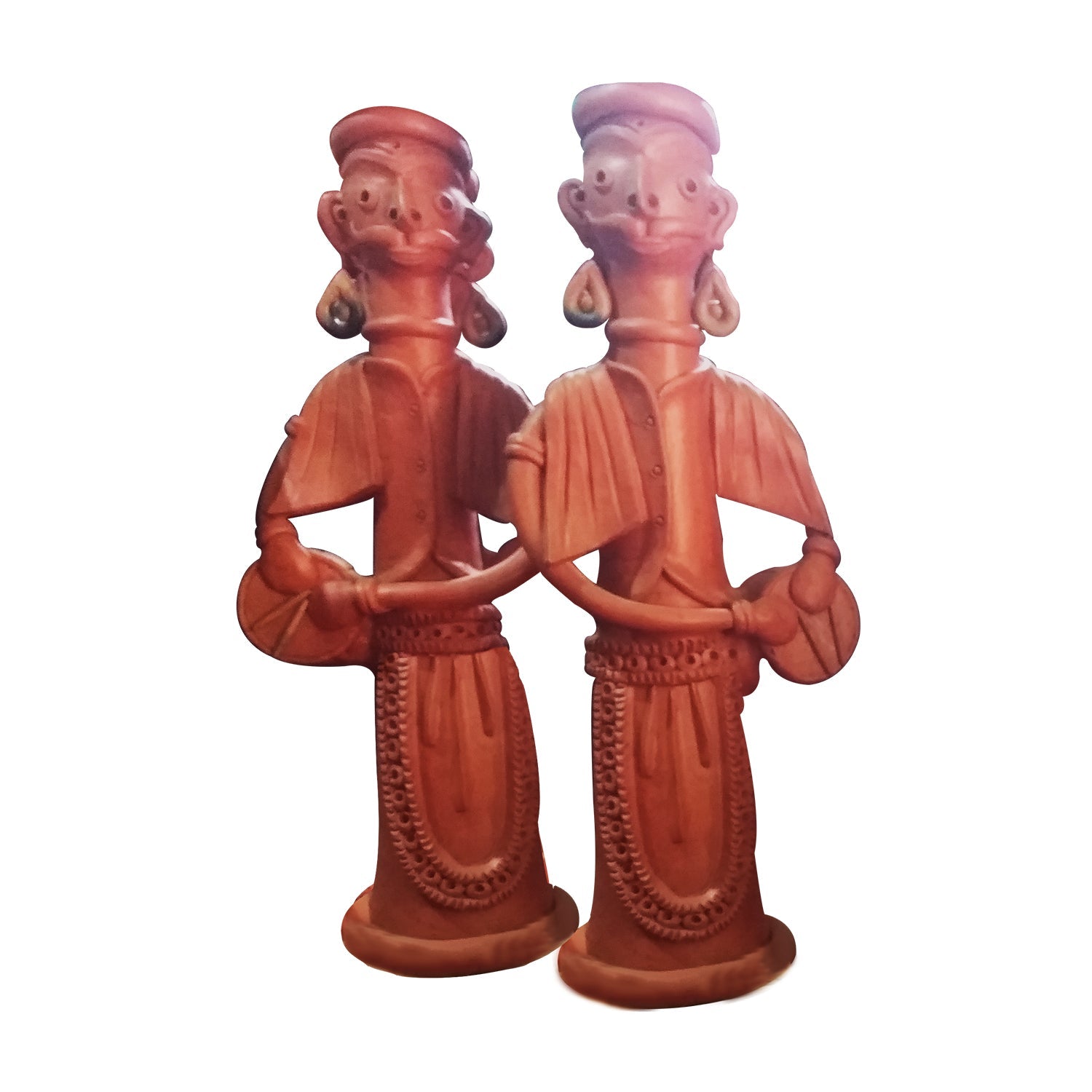 A front view of a pair of handcrafted terracotta figurines depicting traditional musicians playing drums (dhol). These standing clay dolls feature intricate detailing on their attire and jewelry, showcasing the rustic charm of Indian folk art with a natural reddish-brown finish against a white background.