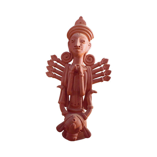 A front view of a handmade terracotta statue of Goddess Durga isolated on a white background. This traditional clay sculpture features the multi-armed deity in a unique folk art style with intricate detailing, standing atop a stylized base, showcasing authentic Indian craftsmanship.
