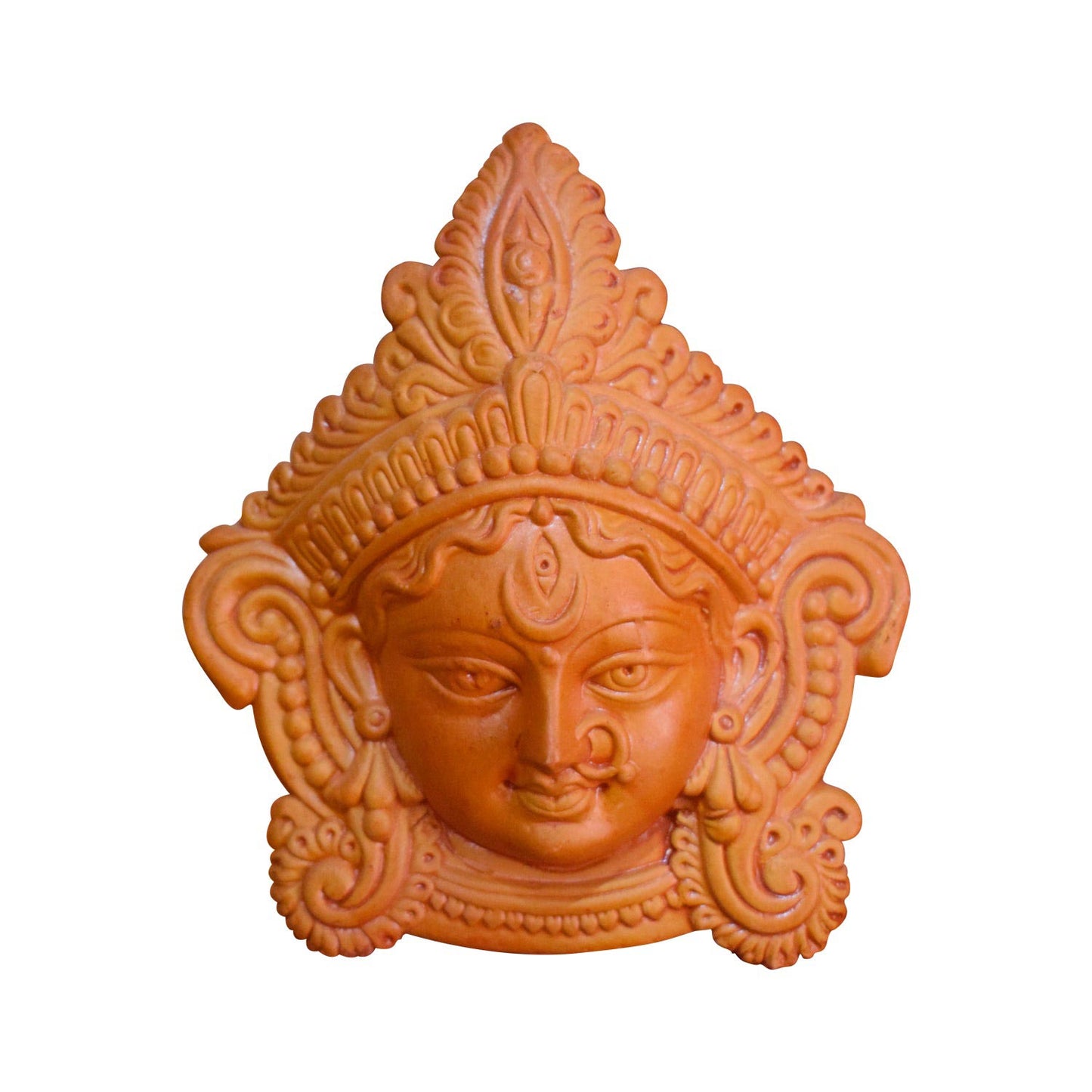 A close-up front view of a handcrafted terracotta wall hanging depicting the face of Goddess Durga. The unglazed clay relief sculpture features an ornate crown, the symbolic third eye, and traditional jewelry details like a nose ring, isolated on a white background.