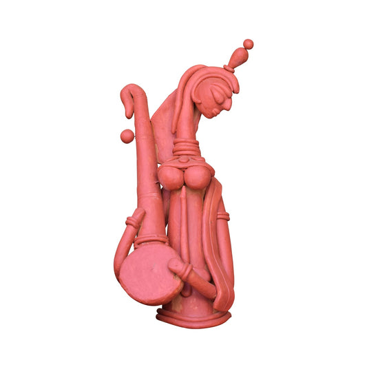 A front view of a handcrafted terracotta sculpture depicting Goddess Saraswati playing the Veena. This traditional clay figurine features stylized folk artistry with elongated features, intricate ornamentation, and a natural reddish-brown earthenware finish, isolated against a white background.