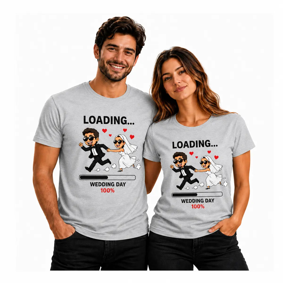 Couple wearing matching grey T-shirts featuring a playful wedding loading design with a running bride and groom, hearts, and “Wedding Day 100%” graphic.