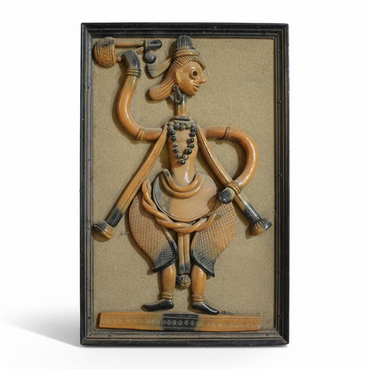 Traditional Indian terracotta wall panel with tribal dance figure, handcrafted clay folk art decor inspired by rural Indian culture.