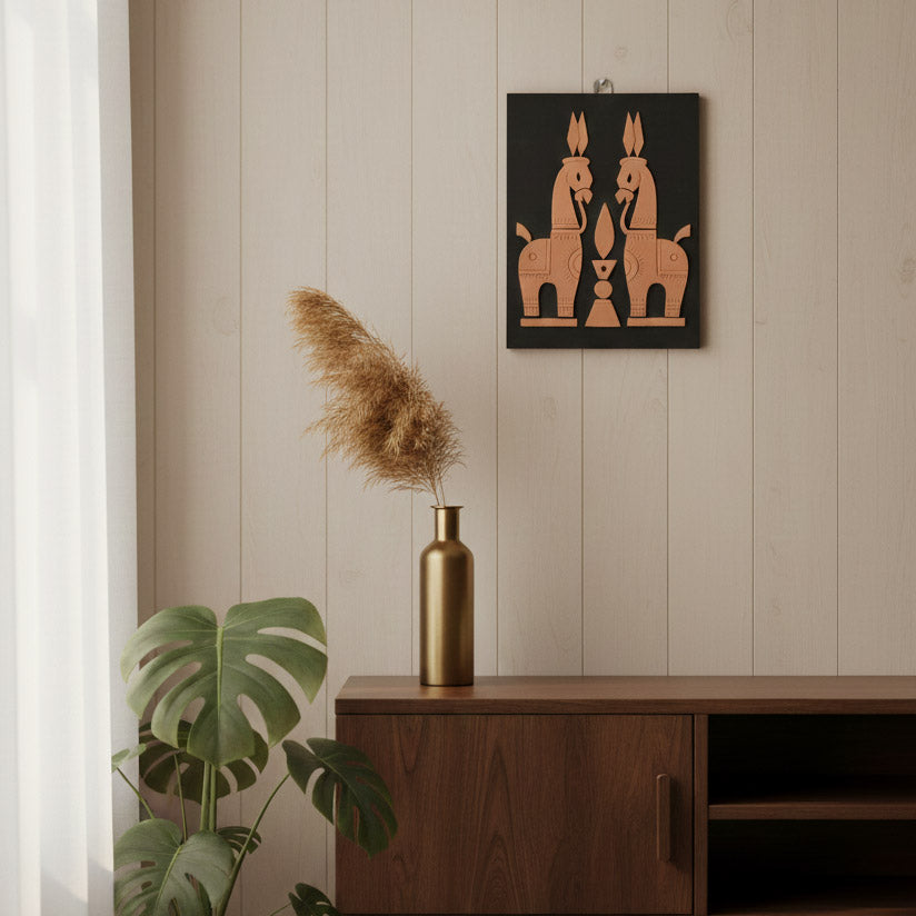 Handcrafted Indian horse wall art panel displayed in a minimalist interior with wooden cabinet and indoor greenery.