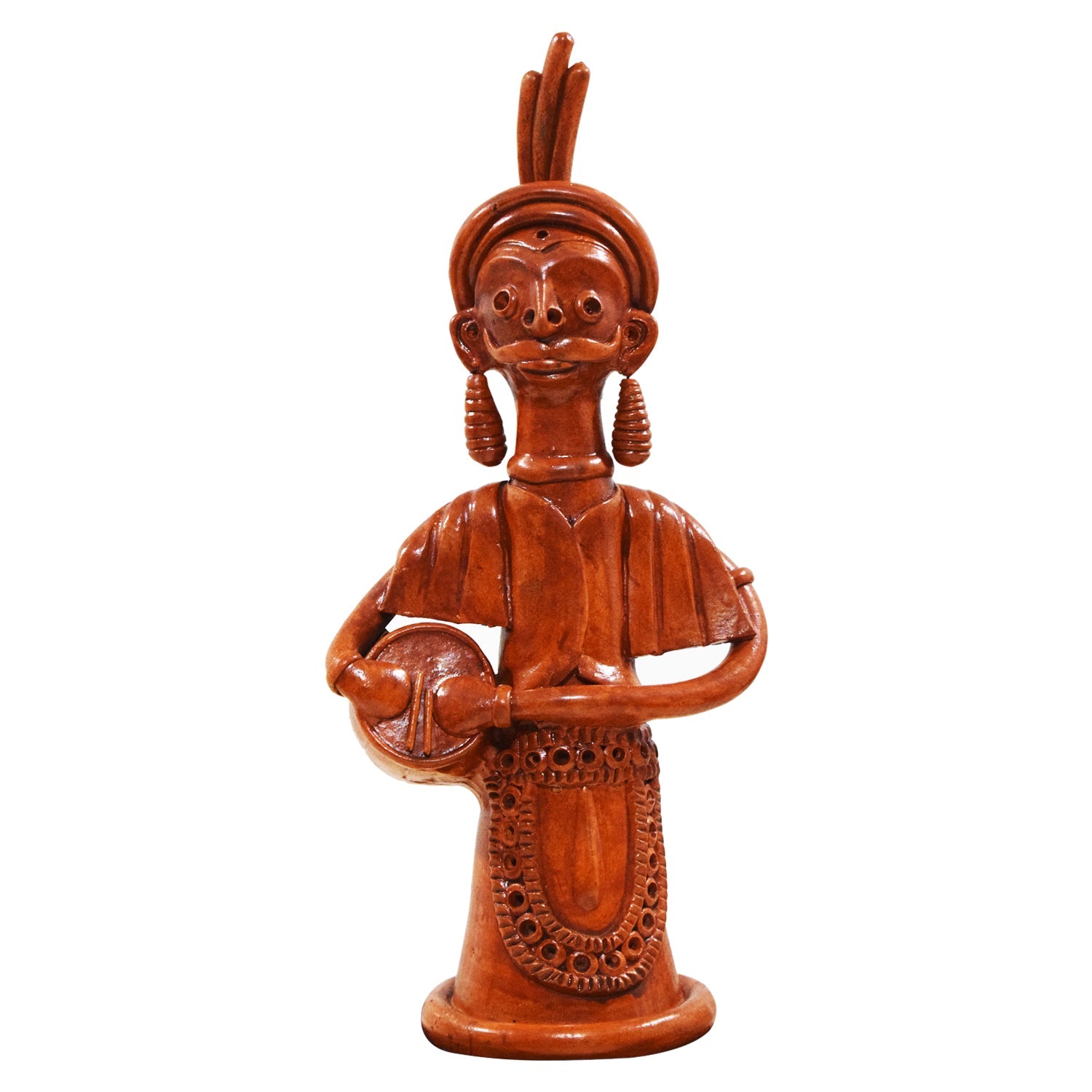 A handcrafted terracotta doll with intricate details, held against a plain background.
