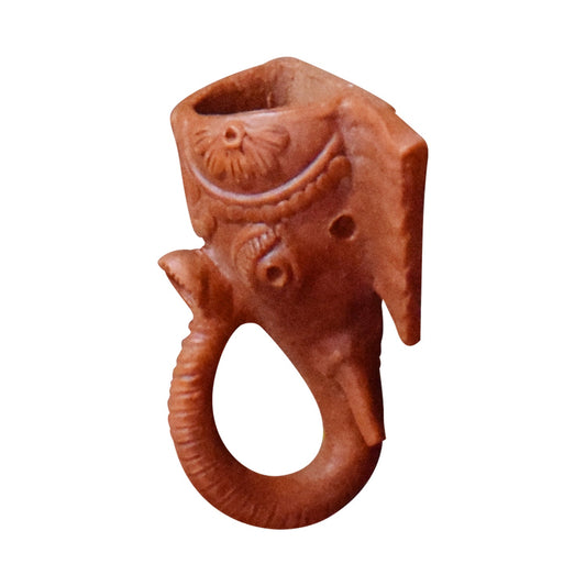 A detailed left-profile view of a handcrafted terracotta Lord Ganesha wall hanging. The image captures the depth of the clay sculpture, highlighting the curved trunk, tusk, and the textured craftsmanship of the traditional Indian elephant deity design against a white background.