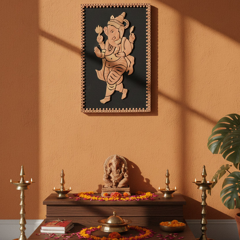 Traditional Indian Ganesha wall art in folk style, styled above a pooja table with diyas and floral offerings.