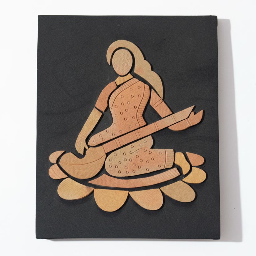 Handcrafted Indian wall art portraying a swarsati musician with veena, modern ethnic decor on black backdrop.