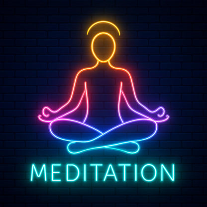 A glowing multicolor LED neon sign depicting a figure in a yoga lotus pose with a halo, transitioning from warm orange and red to cool blue and purple. The word "MEDITATION" is illuminated in bright cyan text below the figure.