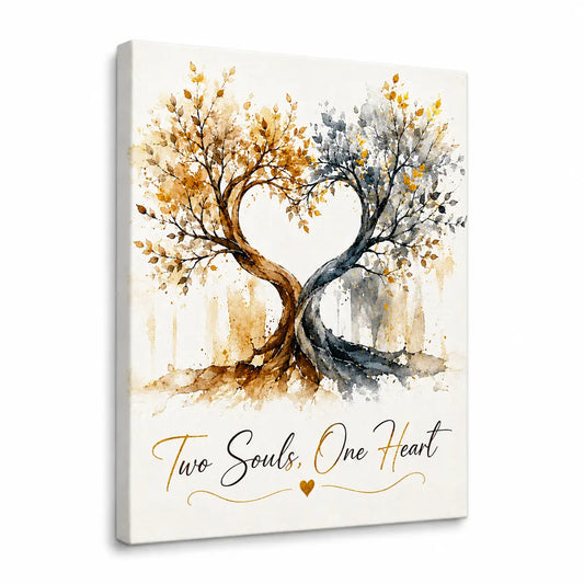 Personalized two souls one heart watercolor tree canvas featuring intertwined heart trees in gold and blue. Romantic wall art perfect for an anniversary gift.