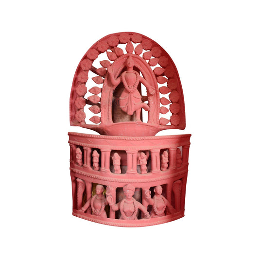 A front view of an intricate handcrafted terracotta wall hanging reminiscent of traditional Indian temple architecture. This two-tiered clay sculpture features a top archway displaying a central dancing figure surrounded by floral openwork, and a curved lower balcony section adorned with rows of smaller carved figures and pillars, all in a natural reddish-brown earthenware finish.