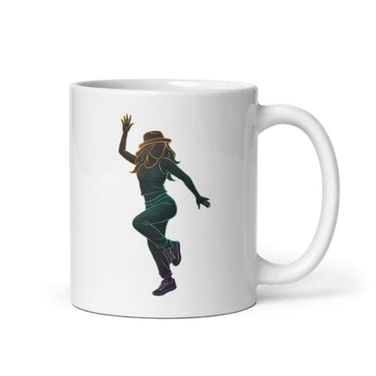 A classic white ceramic coffee mug featuring a stylish, minimalist line-art illustration of a woman dancing. The design depicts a female dancer in a hat and casual streetwear striking a dynamic pose, rendered in a gradient outline transitioning from gold to purple.